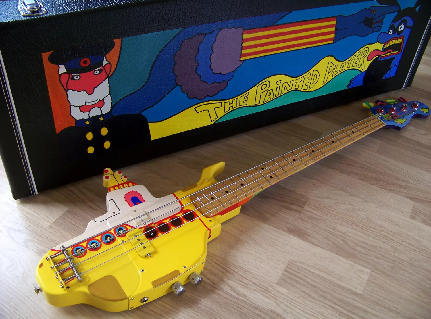 the painted player yellow submaring bass with case 